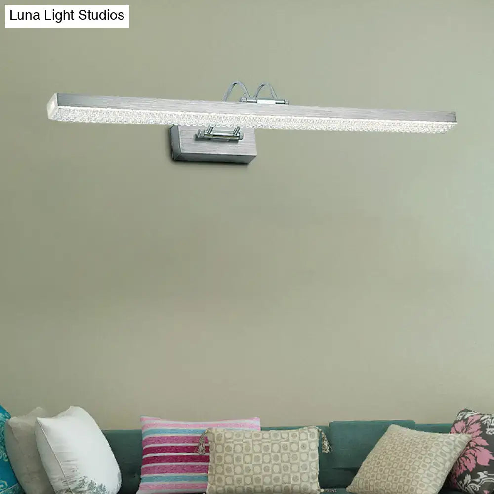 Modernist wall light featuring a rectangular led vanity sconce with textured silver finish and frosted glass panel