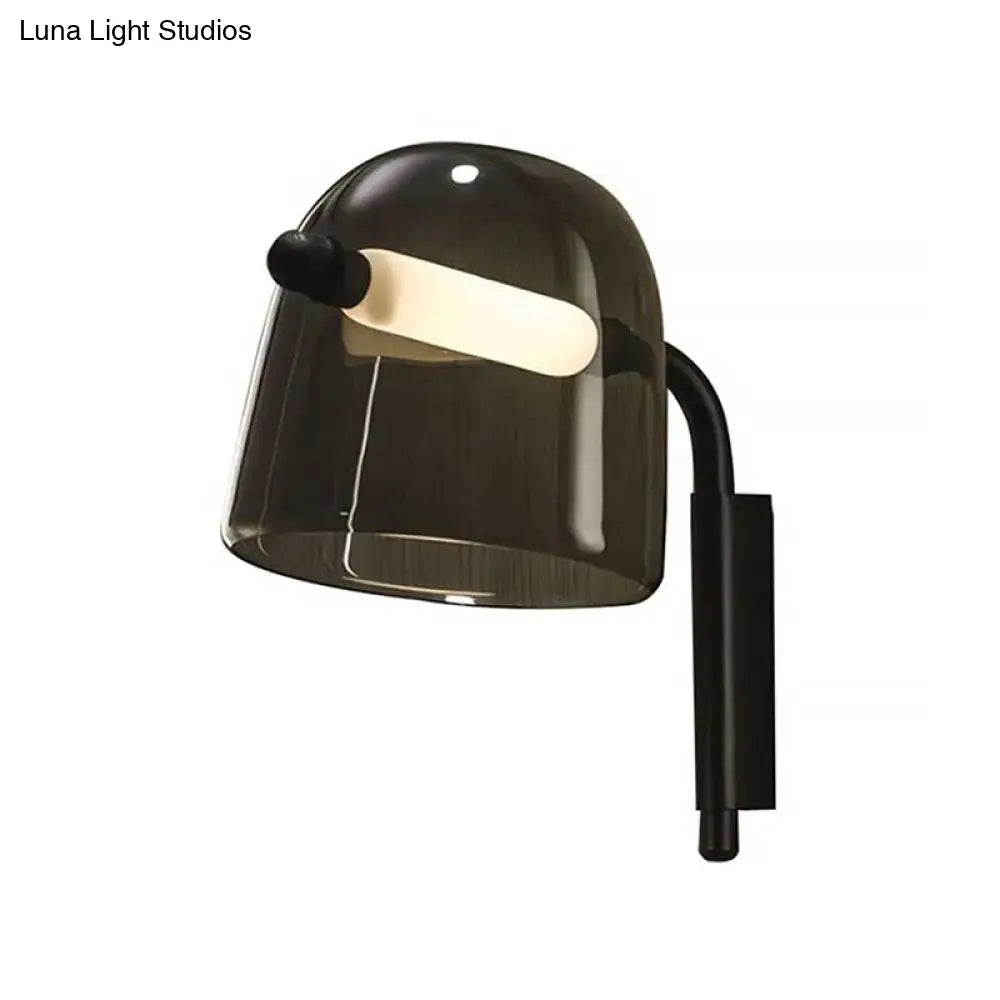 Modernist white black glass wall lamp with sleek curved arm and minimalist smoked glass design for living room sconce