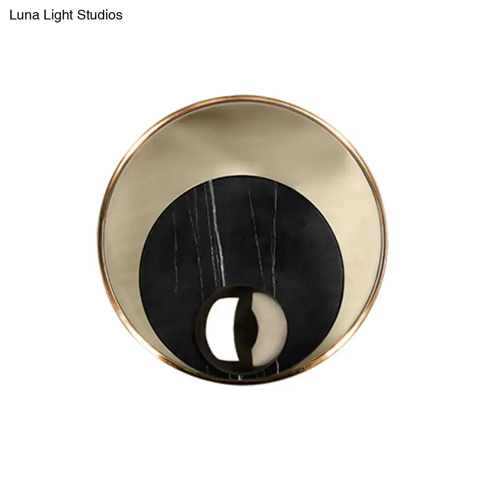 Modernist white black led sconce lighting with round marble black center and polished brass ring for bedroom wall mirror