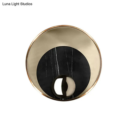 Modernist white black led sconce lighting with round marble black center and polished brass ring for bedroom wall mirror