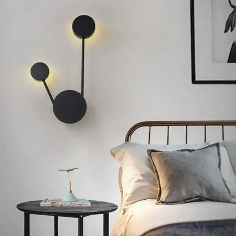 Black minimalist wall lamp with three asymmetrical circular lights from decorbites creative line rgb for living room decor