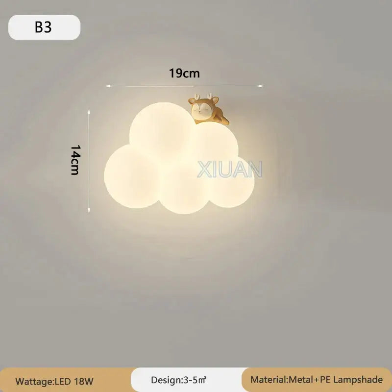 Soft white cloud cartoon wall lamp with golden deer figurine perched on top from monkey decorbites nursery decor