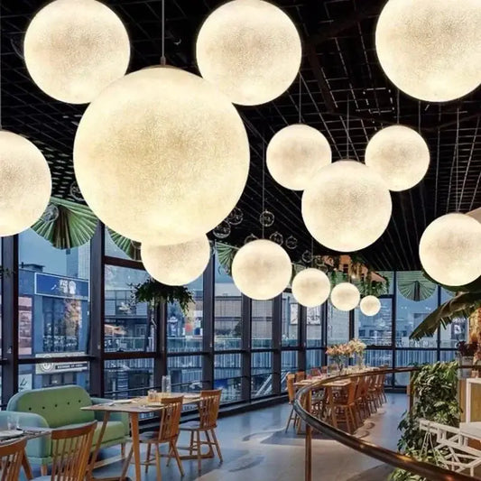 Moon white frosted glass pendant light with textured white finish helps create warmth in bedroom settings