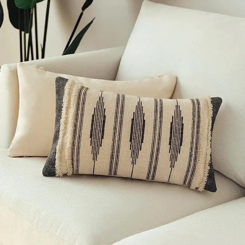 Beige and black woven cushion cover with frayed edges from moroccan geometric cream and mustard cushion cover set