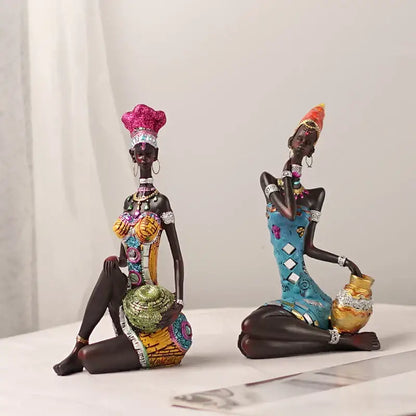 Two intricate mosaic african black women resin art figures in vibrant multicolored attire for living room decorbites decor