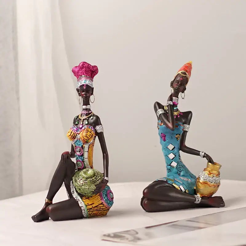 Two intricate mosaic african black women resin art figures in vibrant multicolored attire for living room decorbites decor