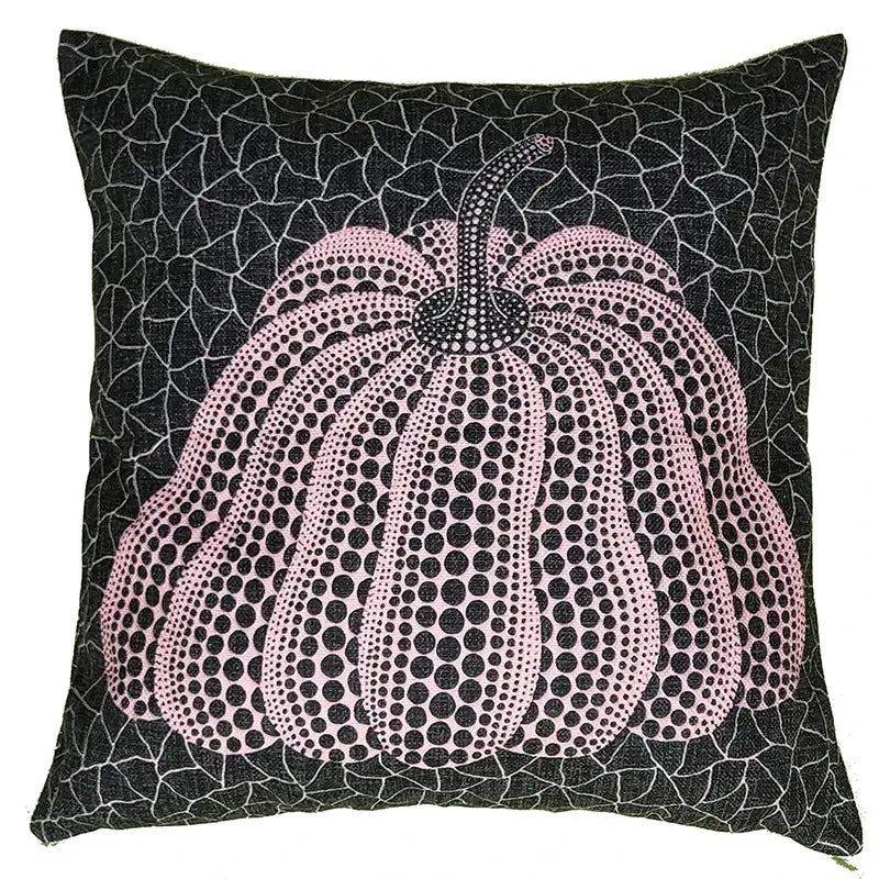A square black decorbites cotton pumpkin pillowcase with a stylized pink dotted pumpkin on a cracked background