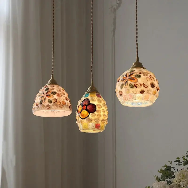 Three spherical mosaic pendant lights with colorful seashells and floral decorbites conch glass led shades for dining room