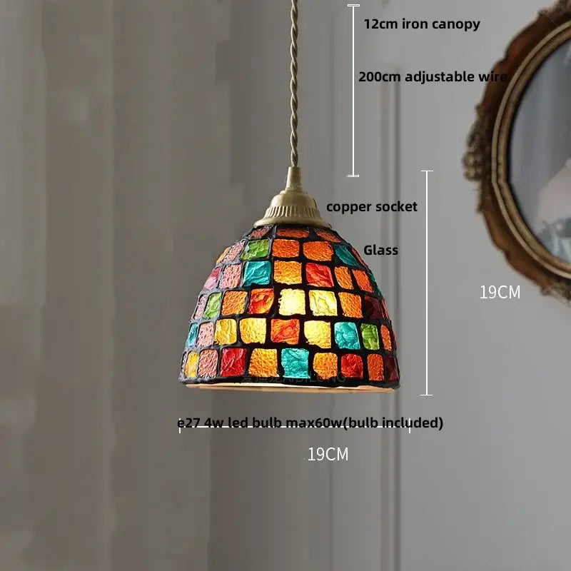 A vibrant dome-shaped decorbites conch glass led pendant light with colorful mosaic panels for dining room decor