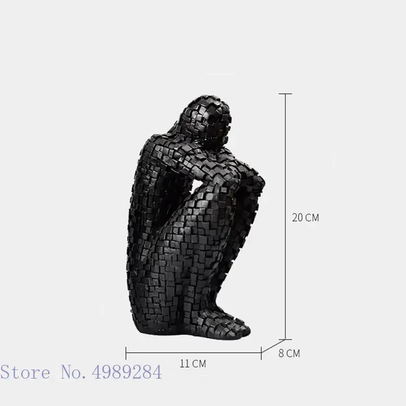 Black mosaic-style golden man thinker figurine crafted from interlocking square tiles for living room decor