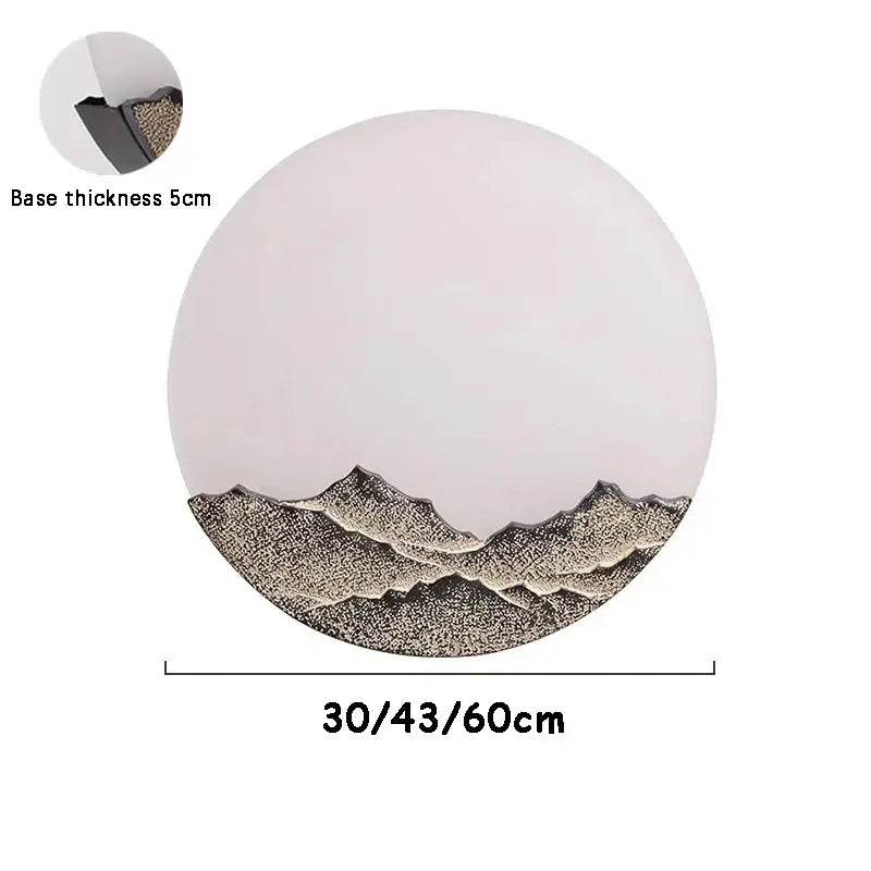 Circular metallic mountain range wall light with textured design on white background for decorbites led wall decor