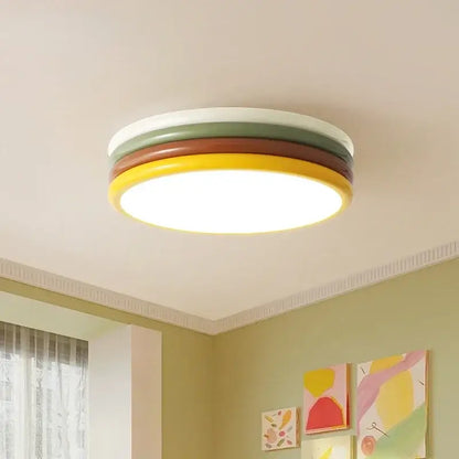 Multi color stack ceiling lamp featuring concentric rings of white olive green brown and yellow by decorbites color stack ceiling