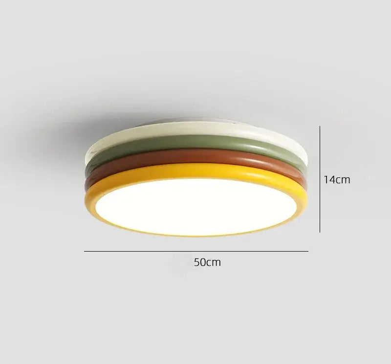 Multi color stack ceiling lamp with rounded led light featuring concentric rings in cream olive green terracotta and mustard yellow
