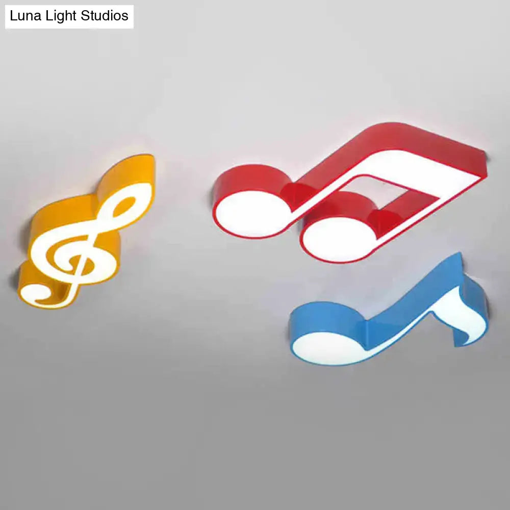 Set of three colorful acrylic musical note led ceiling lights in red blue and yellow for kindergarten use