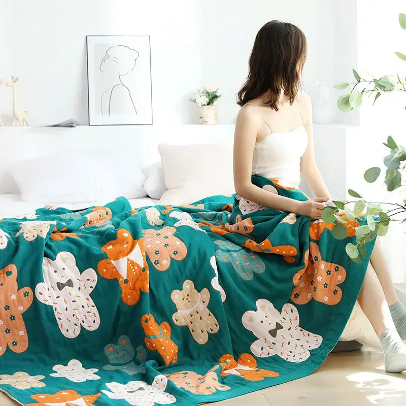Teal multicolor boho printed cotton blanket featuring playful orange and white teddy bear pattern for bedroom decorbites boho printed