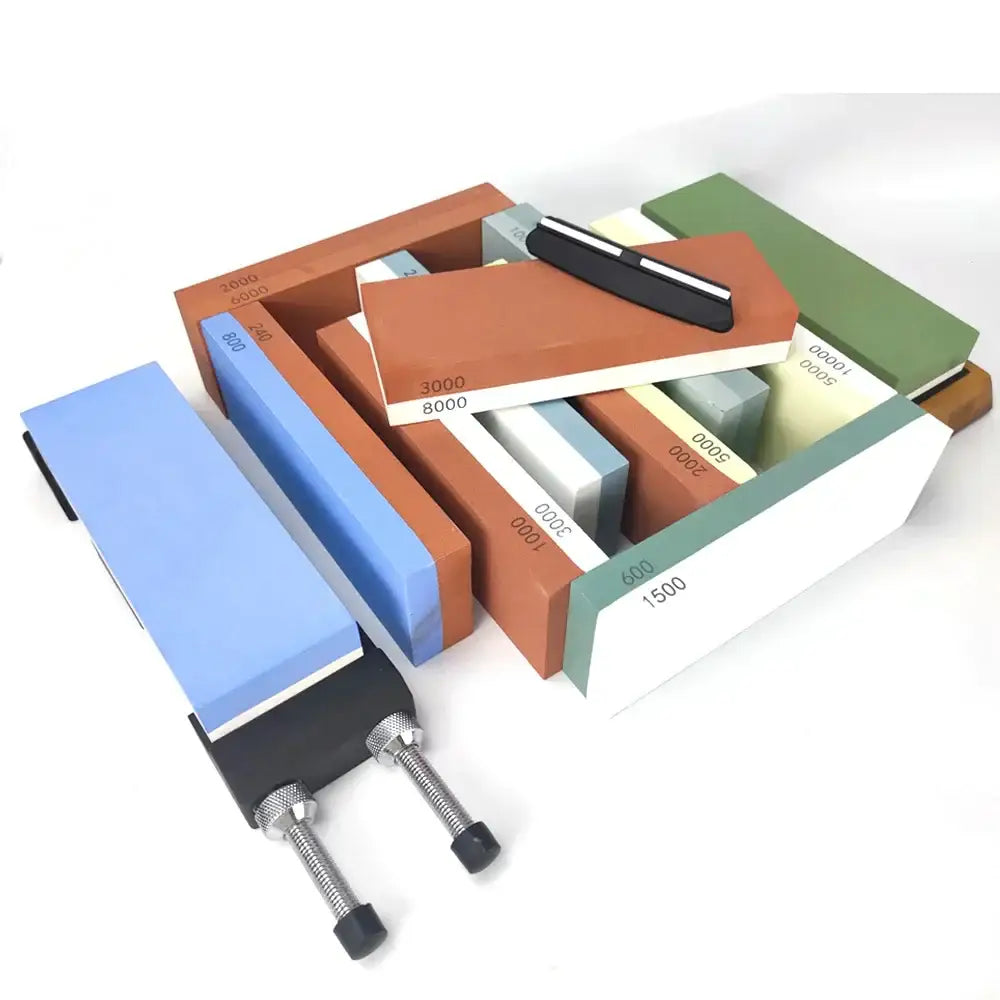 Set of multicolor ceramic knife sharpener whetstones with varying grit and black-handled decorbites knife sharpener holder