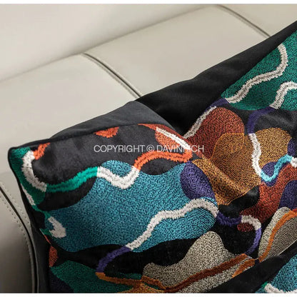 Black velvet cushion cover with vibrant teal orange purple and white decorbites geometric embroidery abstract design
