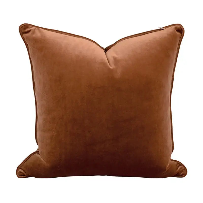 A plush caramel brown velvet cushion cover with neatly stitched edges from decorbites geometric embroidery abstract collection