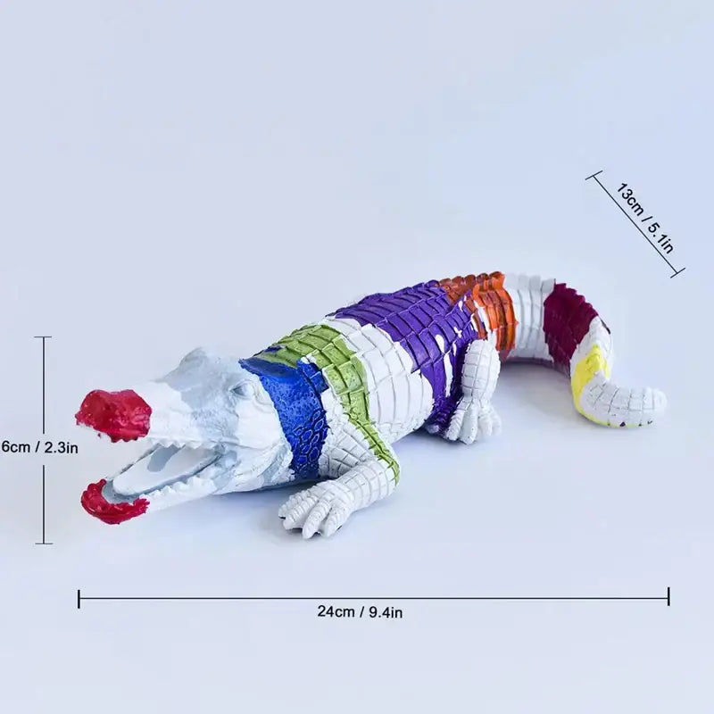 Colorful segmented crocodile wildlife sculpture with vibrant purple blue green orange red and yellow stripes for living room decor