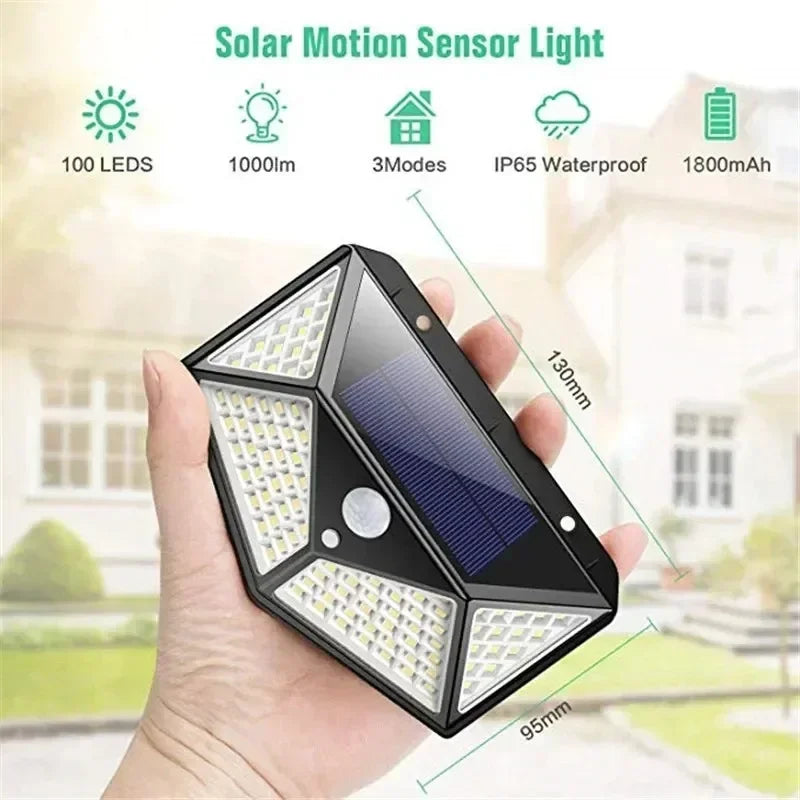 Black triangular solar motion sensor light with 100 leds and built-in battery for outdoor garden decoration
