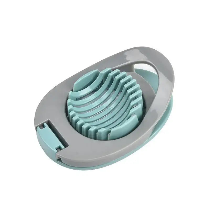 Multifunctional stainless steel egg cutter with a sleek two-toned gray and teal plastic frame kitchen gadget