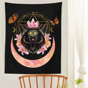 Black tapestry wall hanging featuring a cat witch moon with pink crystals and orange butterflies for decorbites cat witch decor