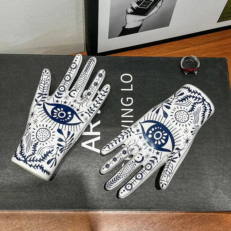 Mystic white and blue ceramic jewelry holder stand with intricate hand-painted eyes suns and floral designs for bedroom decor