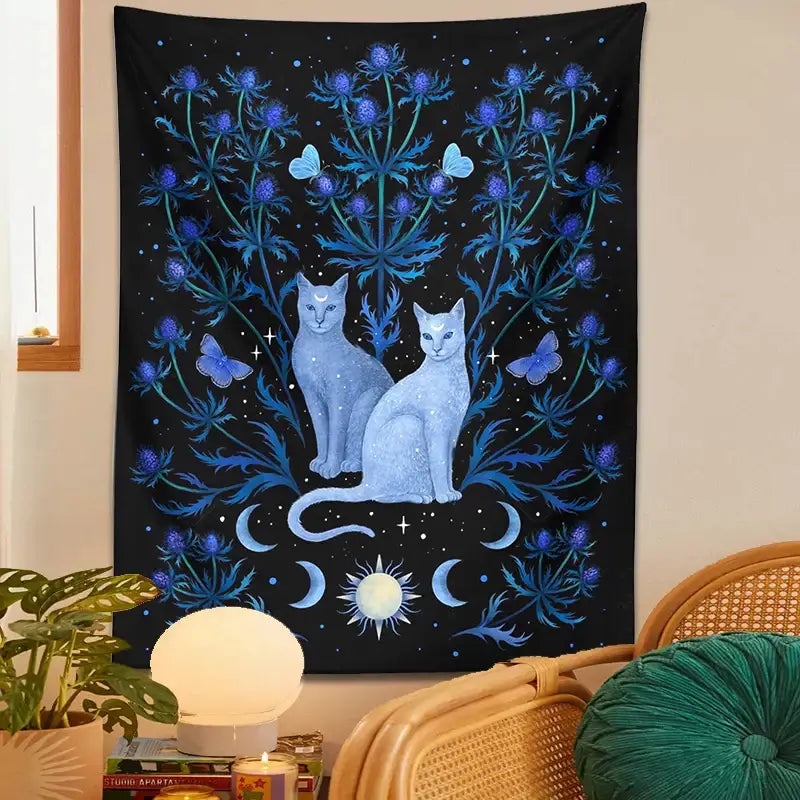 Mystical black and blue decorbites cat tapestry wall hanging featuring light blue cats and celestial purple thistle decor