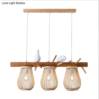 Natural wood and bamboo pendant light with three hanging lanterns and white ceramic birds for dining room island lights