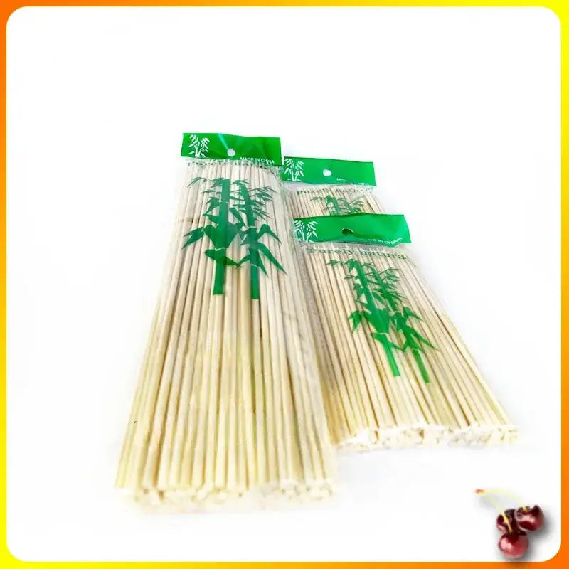 Natural bamboo bbq skewers 100pcs in clear plastic packaging with green bamboo leaf design for kitchen grilling tool