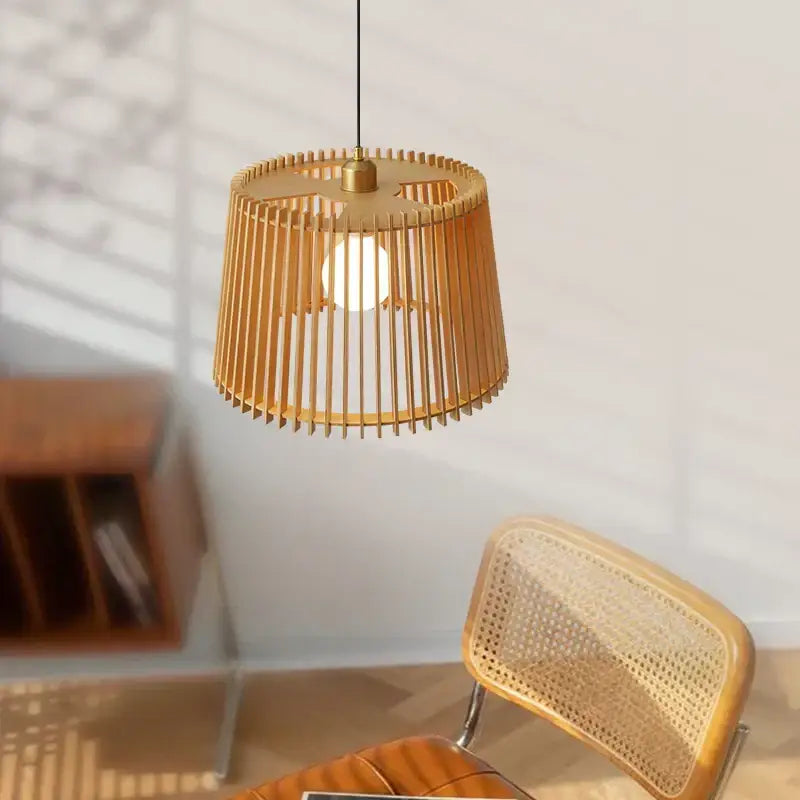 Natural bamboo birdcage chandelier pendant lamp featuring a warm-toned woven rattan shade and brass accents for living room decorbites birdcage chandelier