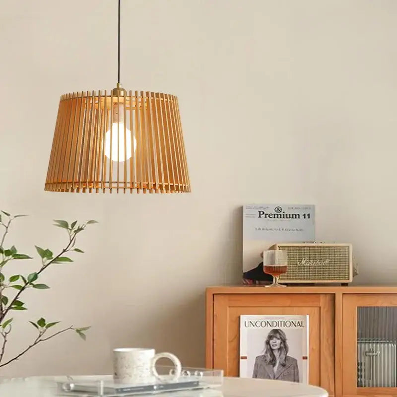 Natural bamboo birdcage chandelier pendant lamp with warm wooden slats and brass top for living room decorbites pendant lamp