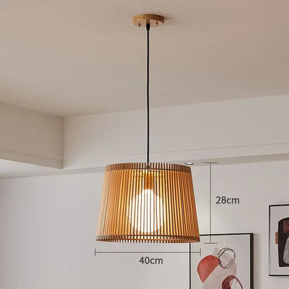 A warm-toned natural bamboo birdcage chandelier pendant lamp with woven shade and black cord for living room decor