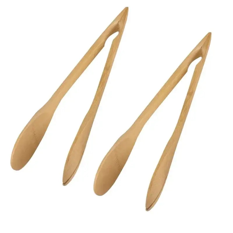 Natural bamboo kitchen food tongs set of 4 with smooth light tan finish and gently curved handles by decorbites bamboo kitchen
