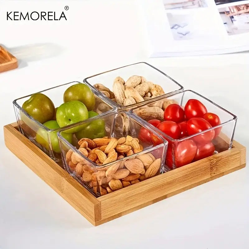 Clear glass bowls with snacks on a natural bamboo wooden rectangular tea tray for dining room use