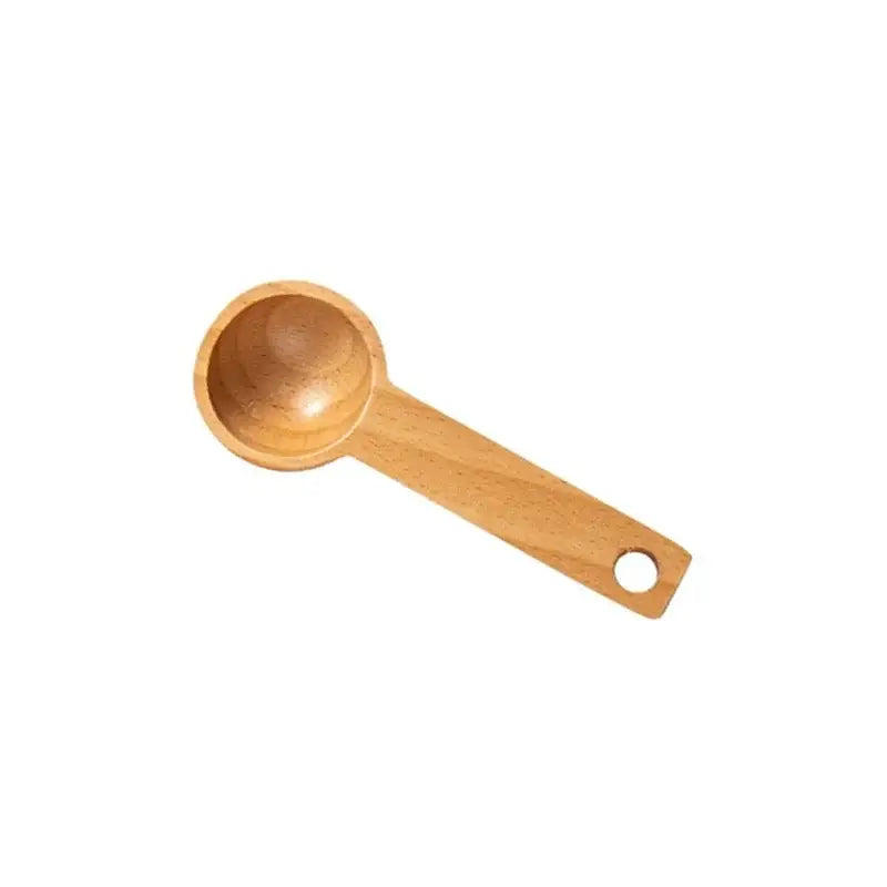 Light brown beech wood tablespoon coffee scoop with rounded bowl and hole handle from set of 5 kitchen spoons