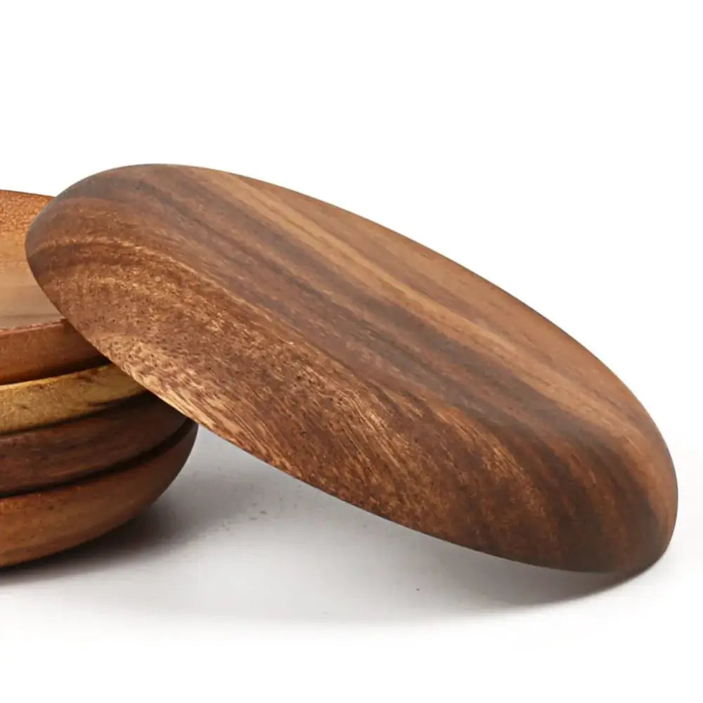 Smooth oval-shaped wooden round lid with rich brown tones and natural grain for natural beech wooden round plate set