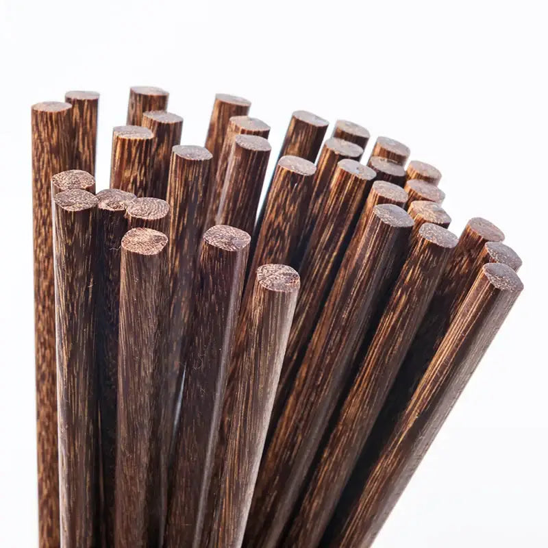 Natural dark brown healthy wood chopsticks set with cylindrical shape and wood grain pattern for dining room tableware