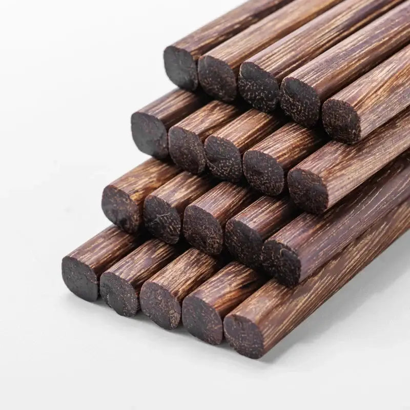 Natural dark brown healthy wood chopsticks set featuring rounded ends and natural wood grain for decorbites healthy wood dining