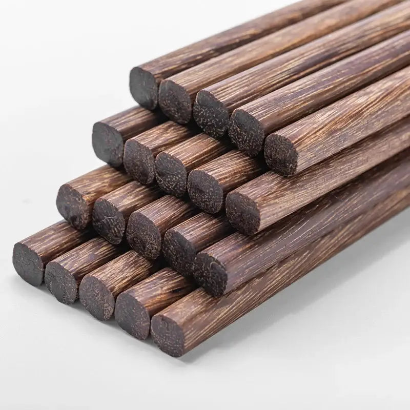 Natural dark brown healthy wood chopsticks set with rounded ends and grain patterns for dining room tableware decorbites