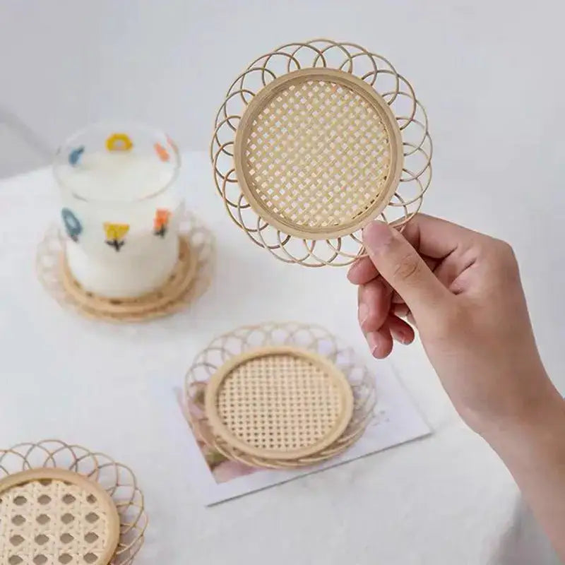 Handheld circular coaster in light beige woven rattan with lace-like edge from natural lace bamboo woven coasters storage basket set
