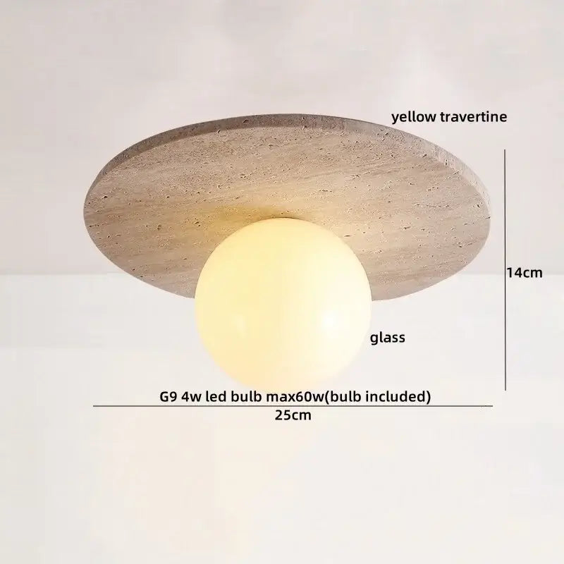 A modern ceiling light with a circular yellow travertine ellipse stone base and warm spherical glass globe for decorbites ellipse stone led