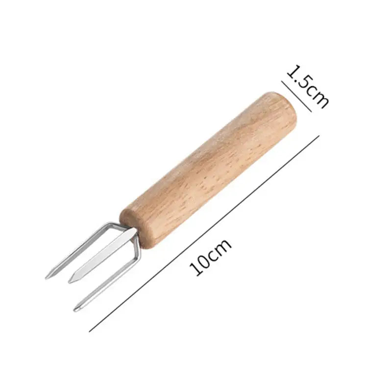 Natural wood three prong espresso stirrer with light brown handle and metallic tines for decorbites espresso stirrer use