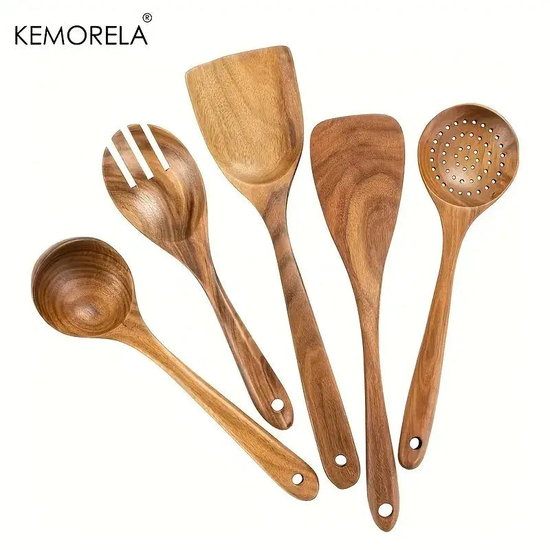 Set of five natural wooden kitchen utensils with smooth polished surfaces in a natural wooden tableware set