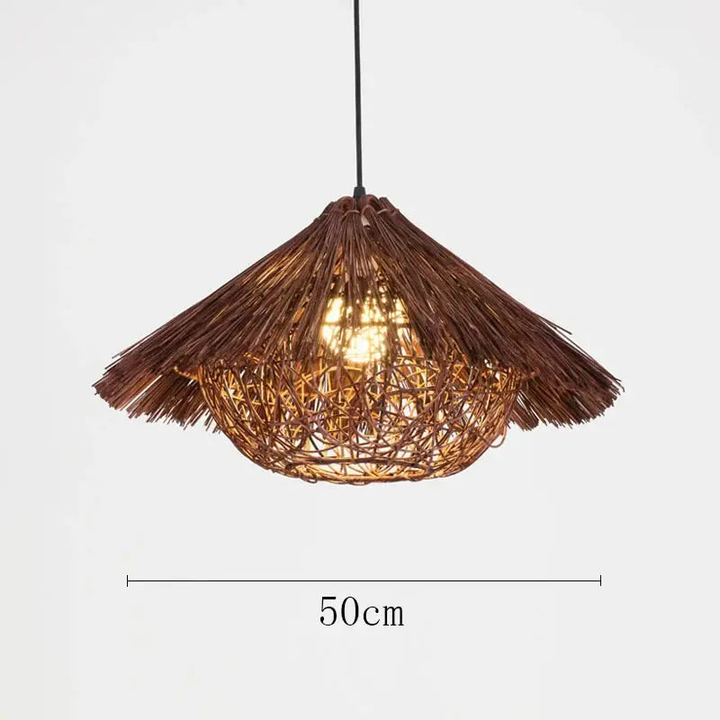 Natural woven brown rattan pendant light with a thatched conical shade and intricate lattice design for dining rooms