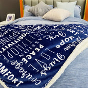 Navy and cream decorbites cozy printed flannel blanket with white cursive patterns and fleece border for living room use