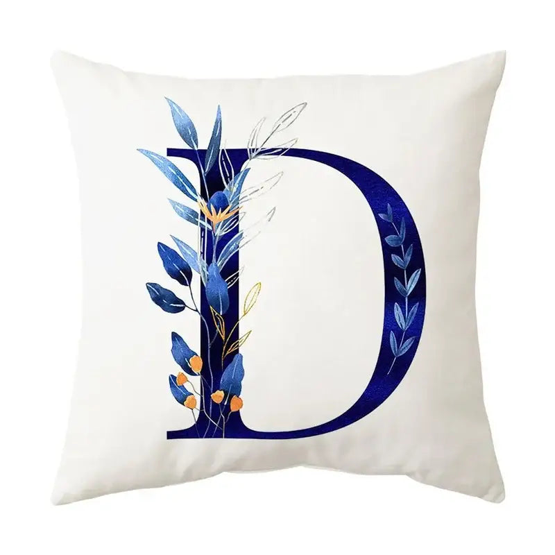 White throw pillow featuring a navy and gold alphabet flower letter d for decorbites blue alphabet bedroom decor