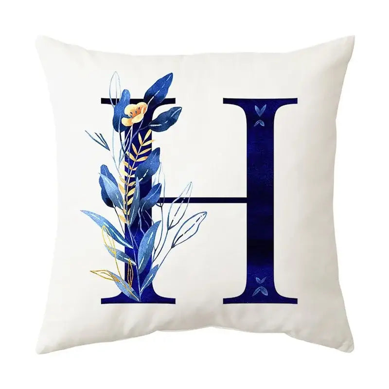 White throw pillow with navy and gold alphabet flower letter h featuring decorbites blue alphabet for bedroom decor