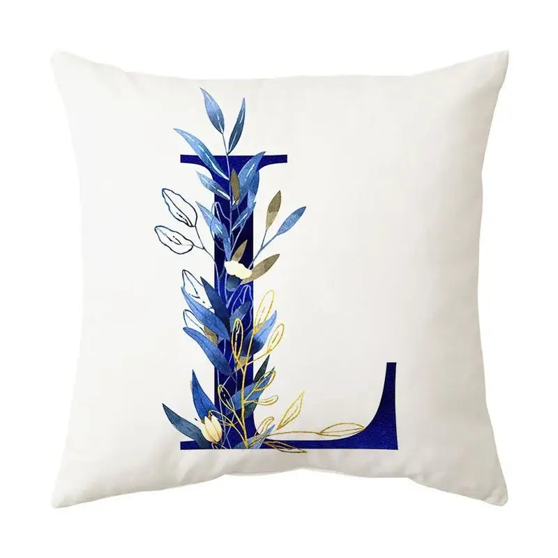 White throw pillow with navy and gold alphabet flower letter l featuring blue alphabet flower decorbites design