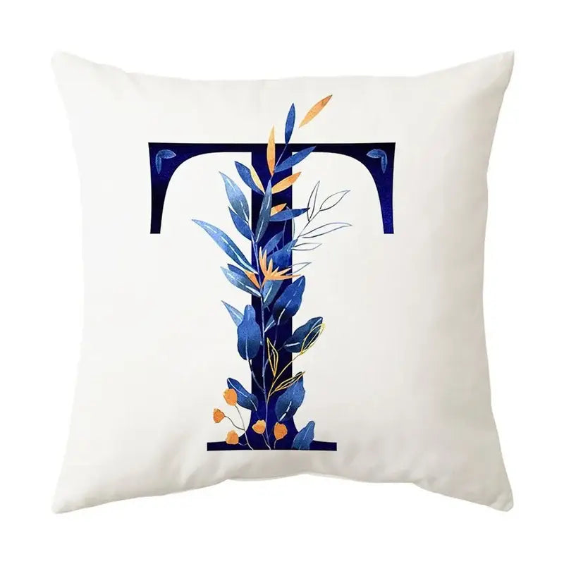 White throw pillow with navy blue stylized t and gold accents for decorbites blue alphabet bedroom decorbites blue alphabet